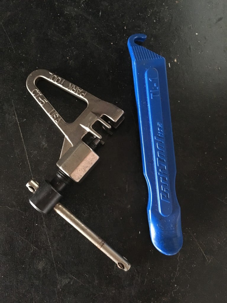 A chain tool and tire lever